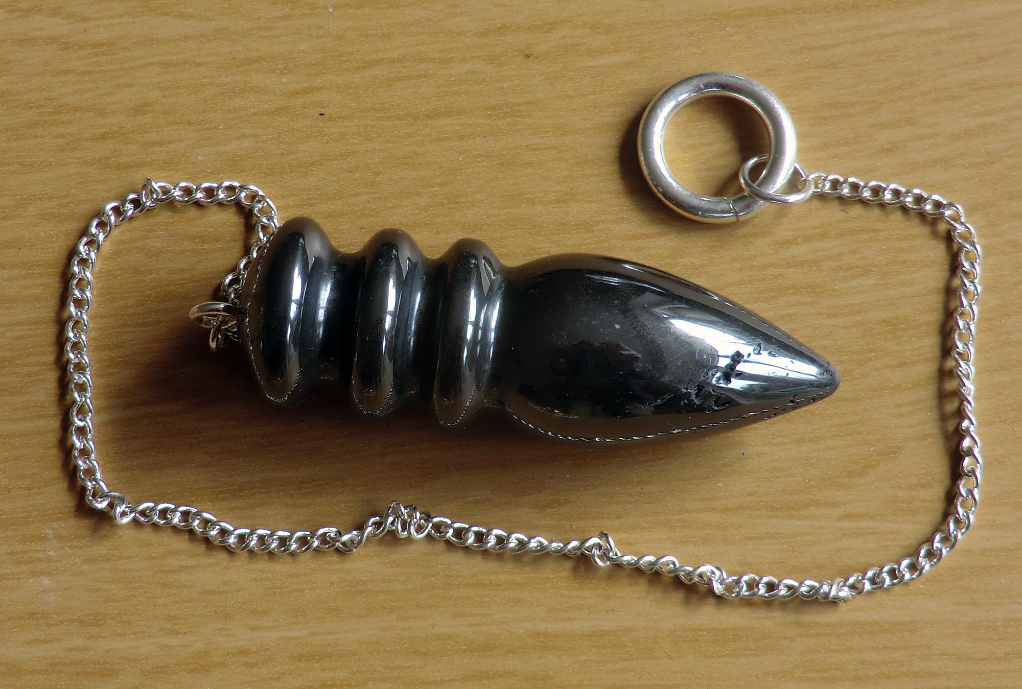 Haematite Egyptian Style Dowsing Pendulum (Slight defect in the stone)